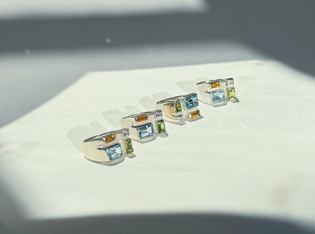 Legier Rainbow Baguette Ring Citrine, Peridot and Sky Blue Topaz Rings in Silver.  There are four of them.